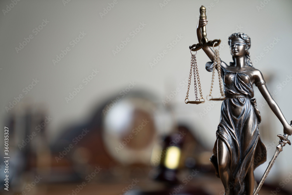 Lawyers office concept. Law symbols composition: gavel, scale and Themis statue. Lawyers office concept. Law symbols composition: gavel, scale and Themis statue.