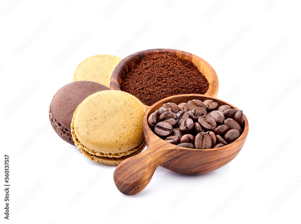 Fototapeta premium Sweet coffee macarons with coffee beans isolated on white background. Clipping Path.