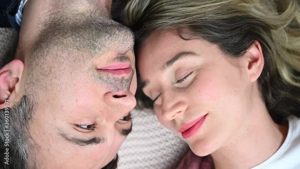 Happy couple smiling face to face, top view Happy couple smiling face to face, top view