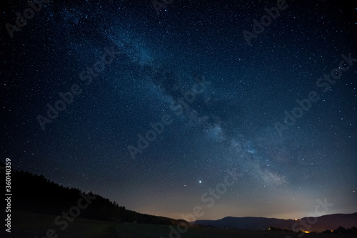 Milky way galaxy over small bavarian village © Robert Ruidl