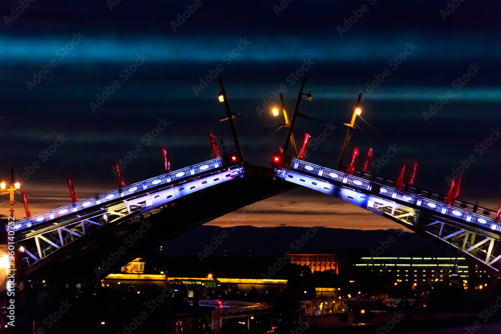 Opening of Palace drawbridge. Night view of Palace bridge from the Neva river in Saint Petersburg, Russia