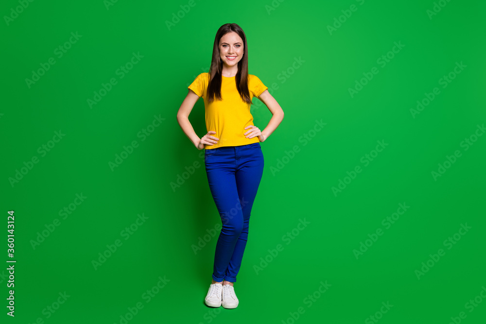 Full length body size view portrait of her she nice attractive lovely pretty cheerful cheery girl wearing comfortable clothes posing isolated bright vivid shine vibrant green color background Full length body size view portrait of her she nice attractive lovely pretty cheerful cheery girl wearing comfortable clothes posing isolated bright vivid shine vibrant green color background