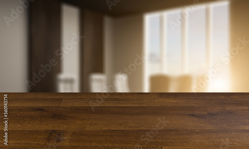 blurred interior on a wooden table background.meeting room with a large window and wood paneling on the walls. Large table and office chairs.. 3D rendering.. Sunset