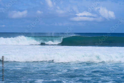 Blue closing surfing wave at popular surf beach Balangan in Bali island  Indonesia