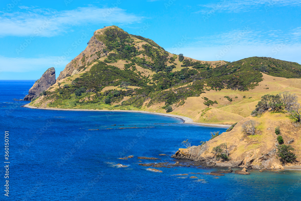 Coastal landscape in the remote far north of the Coromandel Peninsula, New Zealand. Sugar Loaf Hill and the Pinnacles