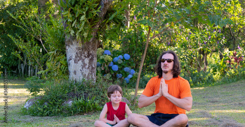 Uncle and nephew meditating and playing in nature.