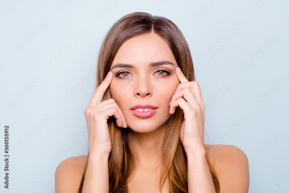 Close up photo portrait of cute pretty attractive brunette she her lady touching wrinkles near temples thinking about making operation or injection isolated on grey background Close up photo portrait of cute pretty attractive brunette she her lady touching wrinkles near temples thinking about making operation or injection isolated on grey background