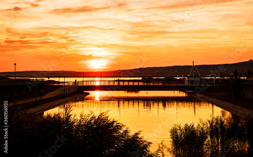 Colorful sunset on Velence lake, west of Hungary © Posztós János