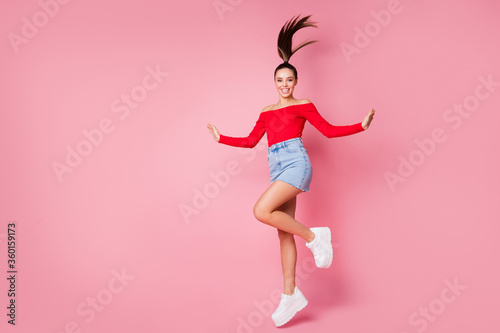 Full length body size view of her she nice-looking attractive lovely slim fit slender cheerful cheery carefree girl jumping having fun free time weekend isolated over pink pastel color background
