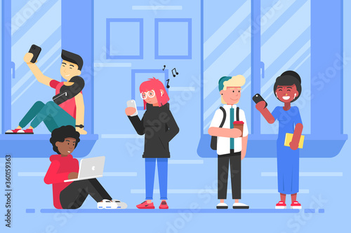 Technology, communication, studentship, multiculture, education concept. Group of young multiracial men women students stand together communicate using smartphone laptop. Mobile chatting with gadgets.