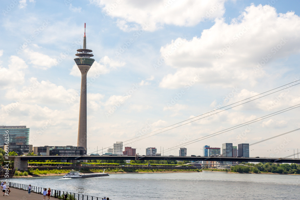 Düsseldorf, Rhine tower and Oberkasseler bridge, view of the Rhine bank
