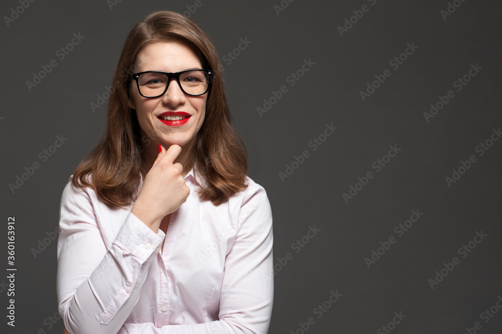 Portrait of attractive office woman with stylish eyeglasses and red lips
