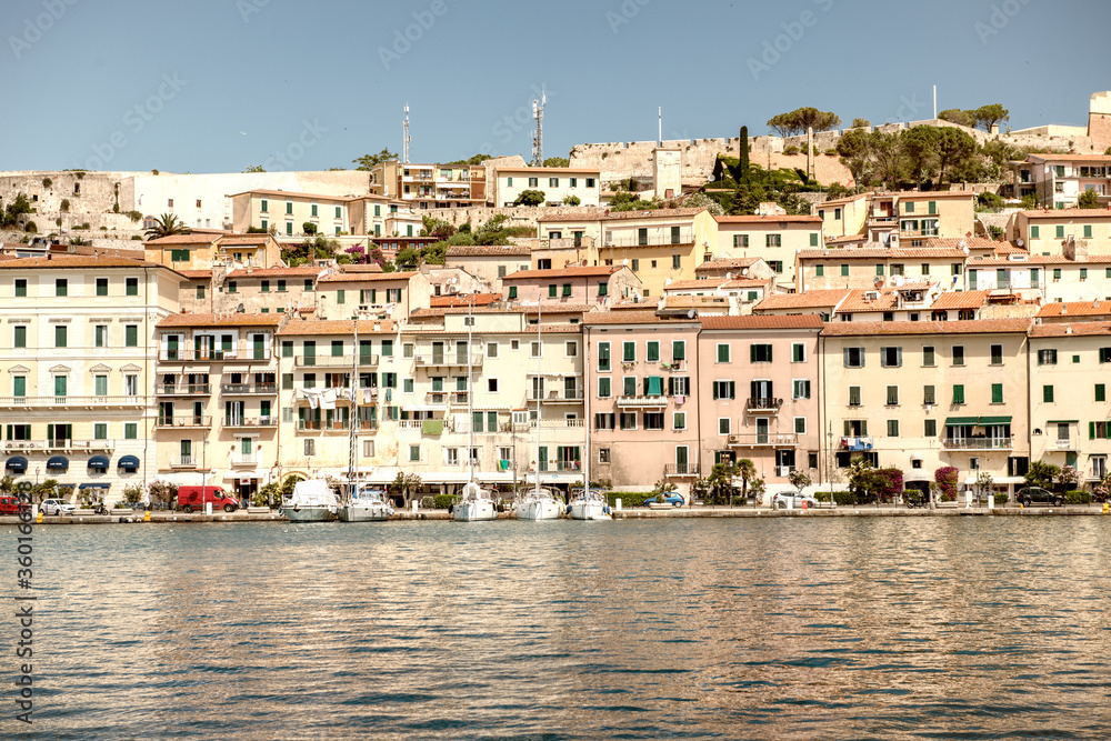 PORTOFERRAIO, ITALY - JUNE 17, 2020: City buildings of Elba Island on a sunny day