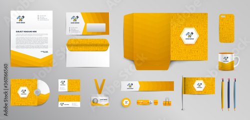 Home repair mockup set of stationery corporate Brand identity. Bright yellow and white color. Working tools, building, construction, renovation. Annual report cover, brochure, corporate mug.