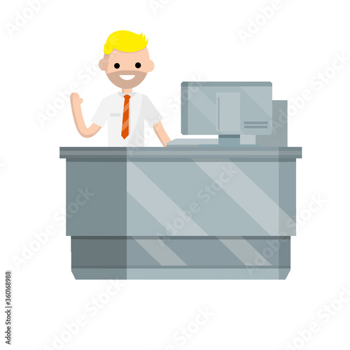 Smiling man in a white shirt is behind the counter. Reception with an employee. Information Desk. Registration and guy. Service sector and computer