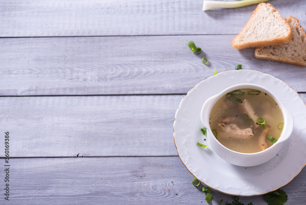 Fresh fish soup with ingredients and spices for cooking. Woodn background Fresh fish soup with ingredients and spices for cooking. Woodn background