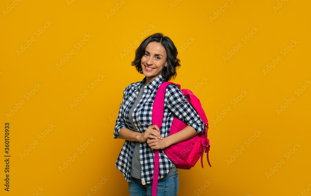 I am gonna be a great student! A half-length photo of a young student, dressed casually, smiling widely at the camera, holding her cute pink backpack on her one shoulder, ready to meet her day. I am gonna be a great student! A half-length photo of a young student, dressed casually, smiling widely at the camera, holding her cute pink backpack on her one shoulder, ready to meet her day.