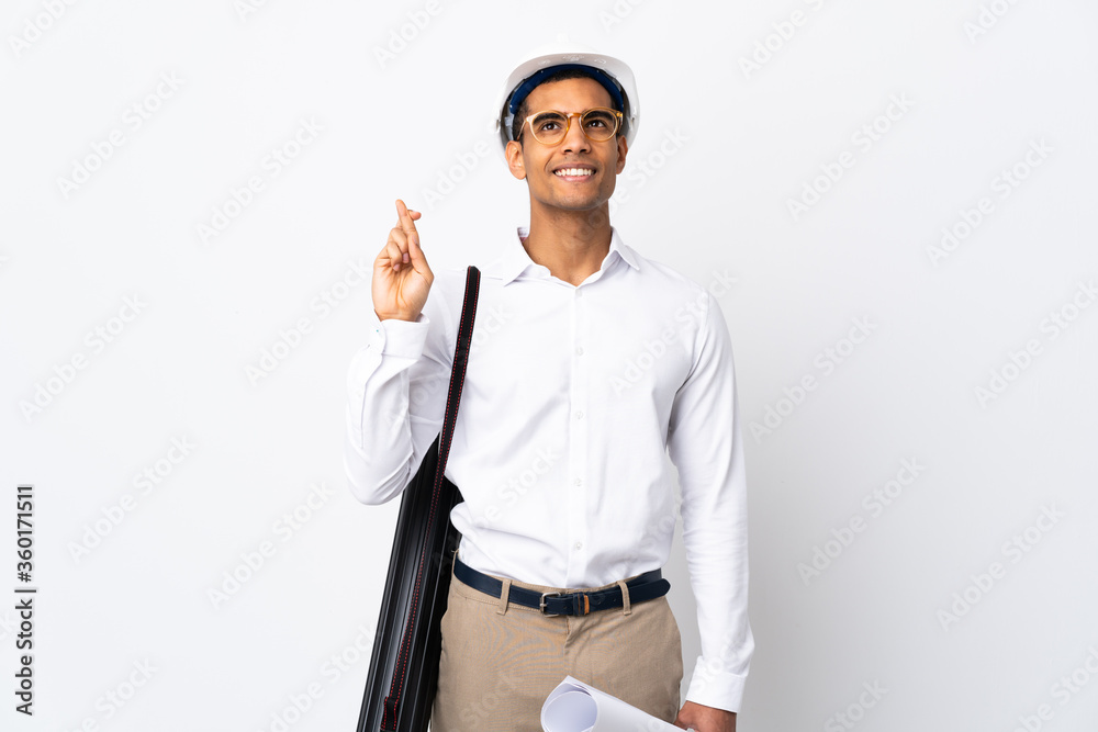 African American architect man with helmet and holding blueprints over isolated white background _ with fingers crossing and wishing the best African American architect man with helmet and holding blueprints over isolated white background _ with fingers crossing and wishing the best