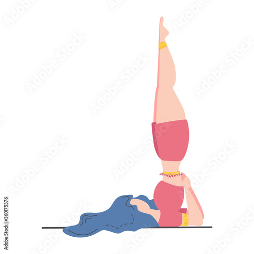 Woman in the pose of the Queen of Asanas - Sarvangasana. Yoga, concept of meditation, health benefits for the body, control of the mind and emotions.