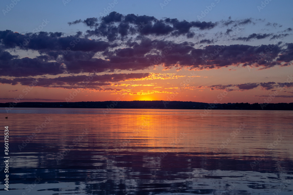 Magical fairytale sunset in the evening on the lake Magical fairytale sunset in the evening on the lake