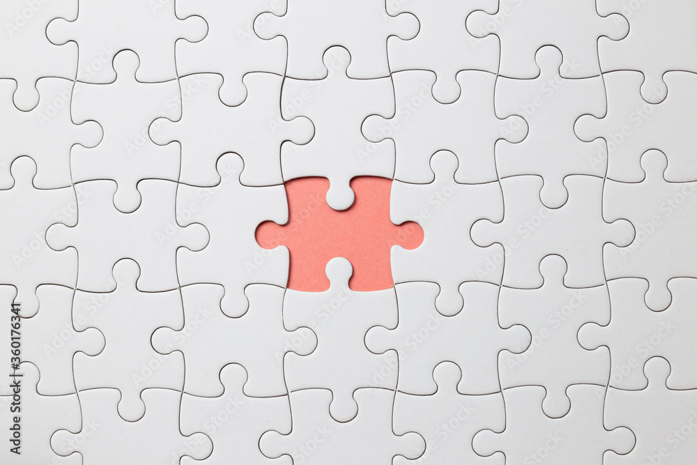 Set of white puzzle pieces and last one piece Set of white puzzle pieces and last one piece