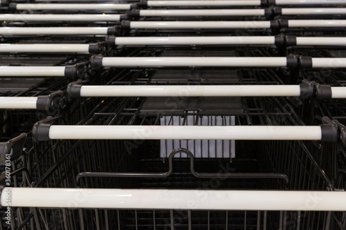 blank shopping carts in row.
