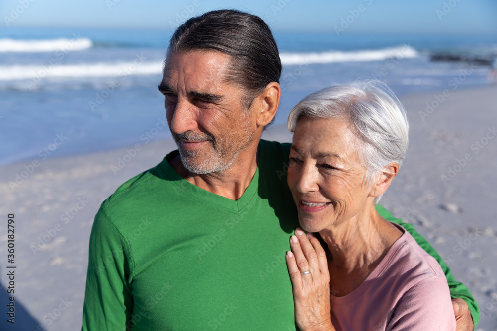 Senior Caucasian couple enjoying time at the beach Senior Caucasian couple enjoying time at the beach