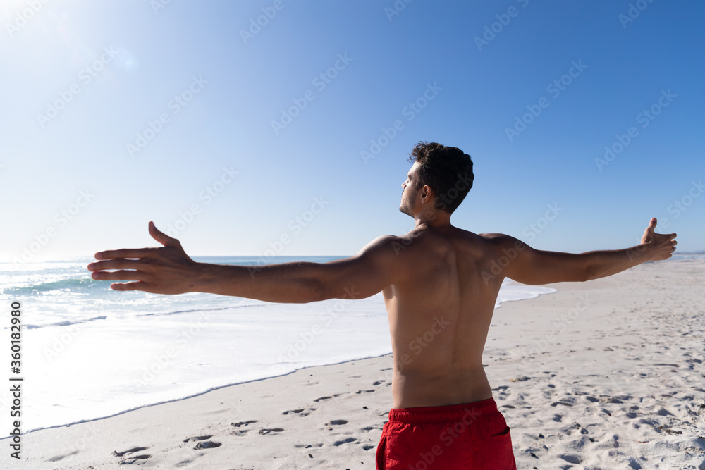 Caucasian man enjoying time at the beach