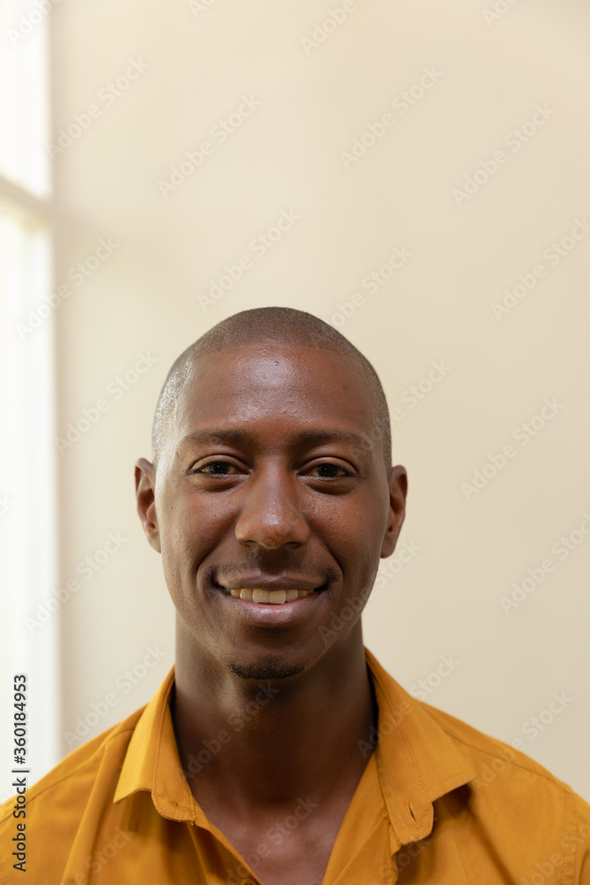 African American man smiling and looking at camera African American man smiling and looking at camera