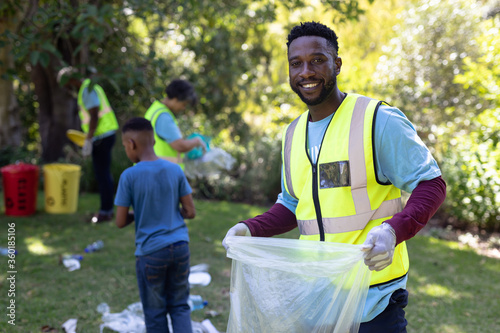 Portrait of an African American man collecting garbage