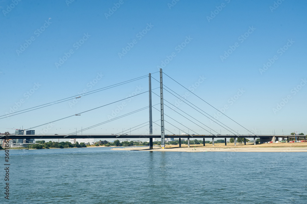 Dusseldorf, Germany – July 24, 2019: The Rheinkniebrücke is a cable-stayed bridge over the Rhine in Düsseldorf, opened to traffic on 16 October 1969.