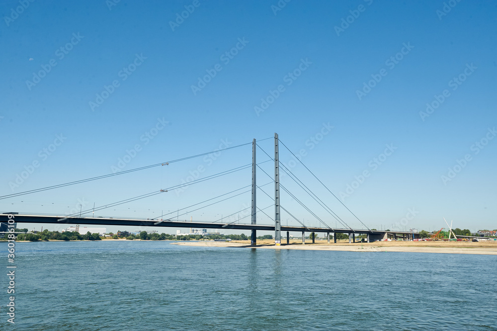 Dusseldorf, Germany – July 24, 2019: The Rheinkniebrücke is a cable-stayed bridge over the Rhine in Düsseldorf, opened to traffic on 16 October 1969.