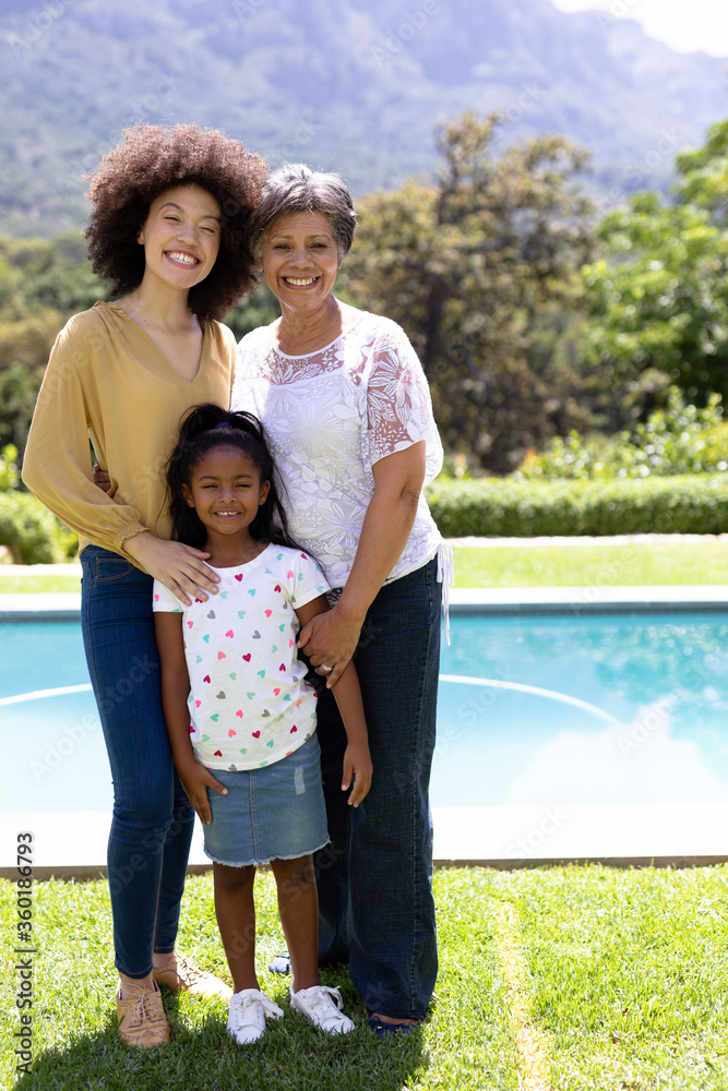 Multi-generation mixed race family enjoying their time at a garden Multi-generation mixed race family enjoying their time at a garden