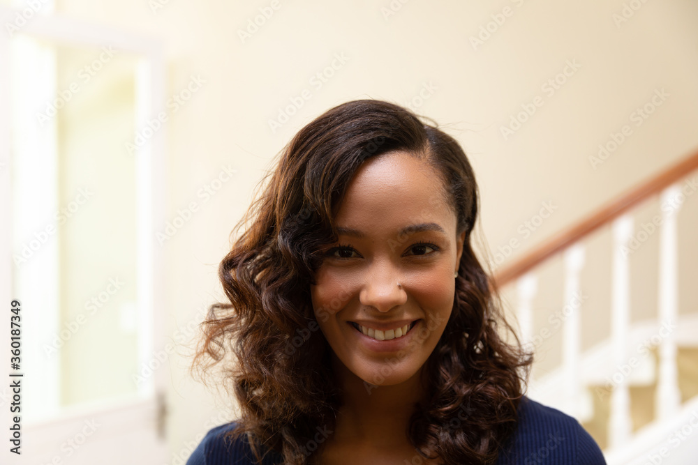 Mixed race woman smiling to camera