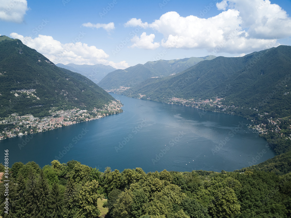 Obraz premium aerial view of como lake in a sunny day with clouds and clear blue sky - Lombardy.