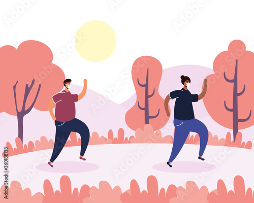 interracial couple walking practicing social distancing in park