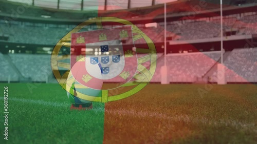 Animation of a Portugeese flag waving over a rugby ball lying on a pitch digital composition photo