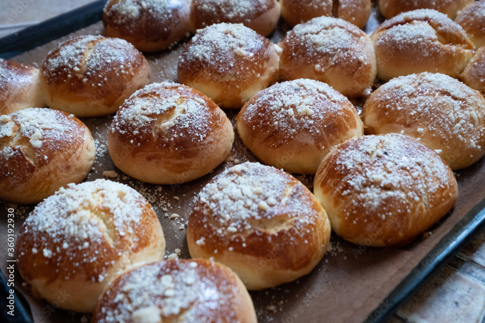 Whole grain buns on table. Fresh baked buns for breakfast