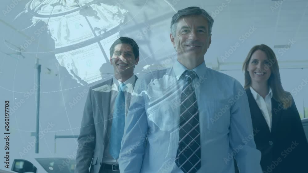 Animation of a globe made of American dollar bills spinning over three Caucasian people looking at t Animation of a globe made of American dollar bills spinning over three Caucasian people looking at t