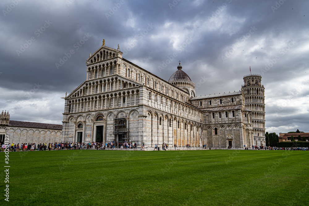 Duomo Leaning tower of Pisa with dramatic sky 