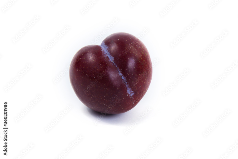 Single plum on white background. Ripe fresh plums. Plums fruit on white background. Single plum on white background. Ripe fresh plums. Plums fruit on white background.