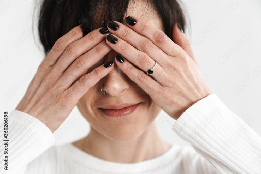 Portrait of an attractive short brunette haired woman Portrait of an attractive short brunette haired woman