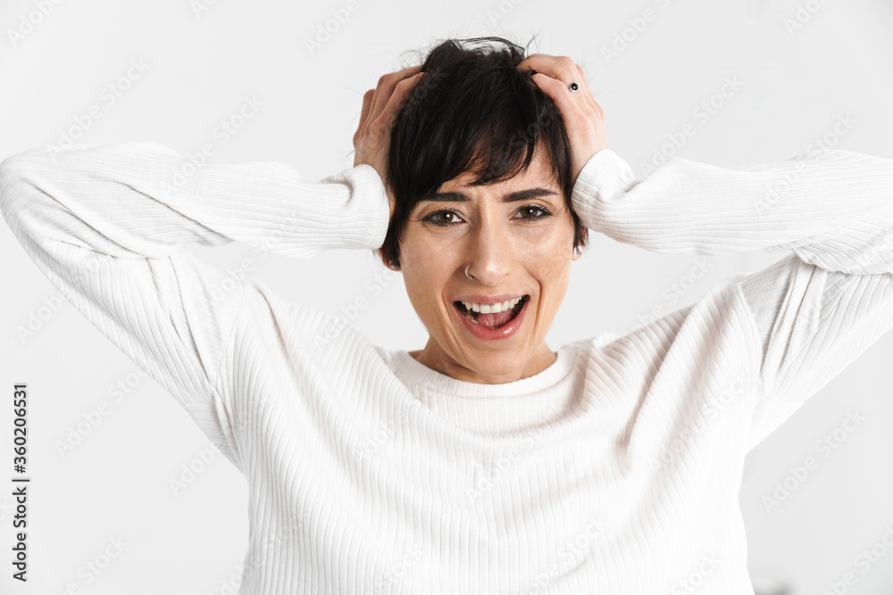 Portrait of an attractive short brunette haired woman Portrait of an attractive short brunette haired woman