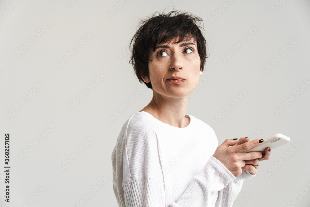 Portrait of an attractive short brunette haired woman Portrait of an attractive short brunette haired woman