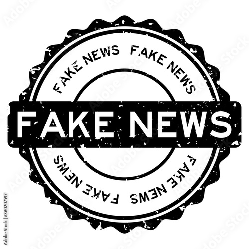 Grunge black fake news word round rubber seal stamp on white background