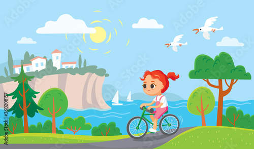 Girl riding a bicycle. Summer mediterranean background.