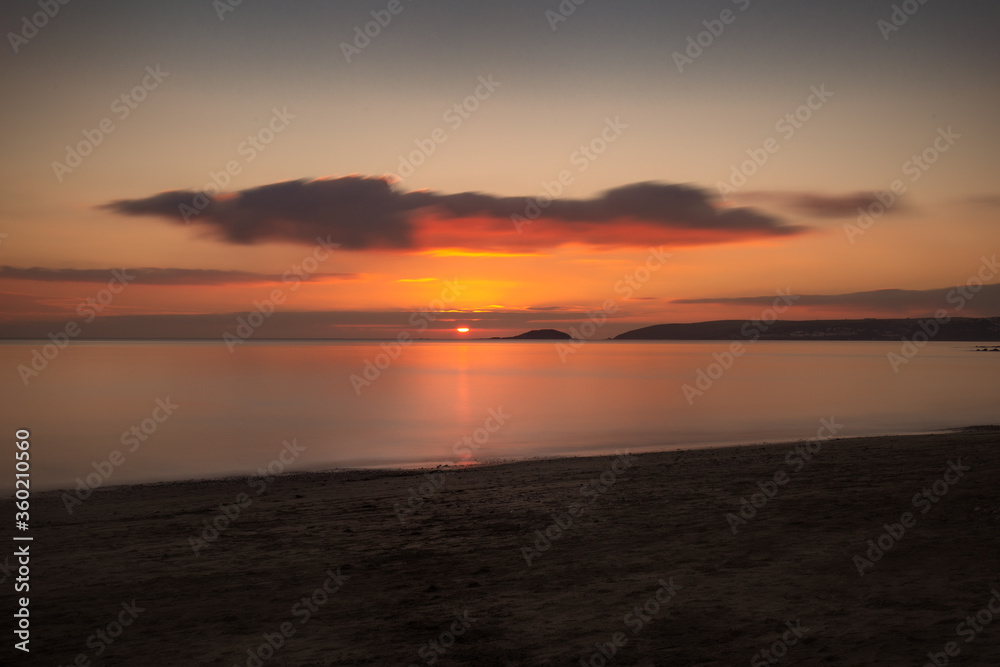 Sunset over Looe Island Whitsand Bay Cornwall