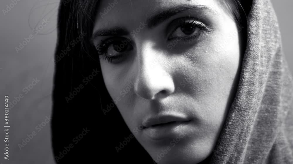 Black and white portrait of strong powerful woman looking camera traveling shot Black and white portrait of strong powerful woman looking camera traveling shot