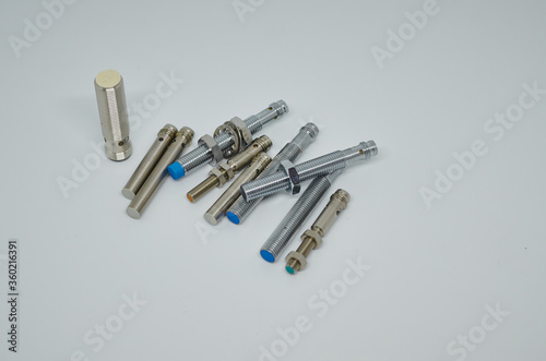 Canvas Print Many Inductive proximity sensor or proximity switch on a white background