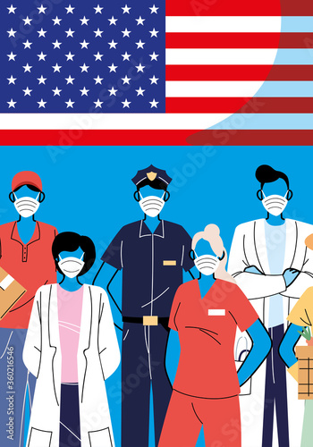 Frontline workers wearing face masks standing with American flag